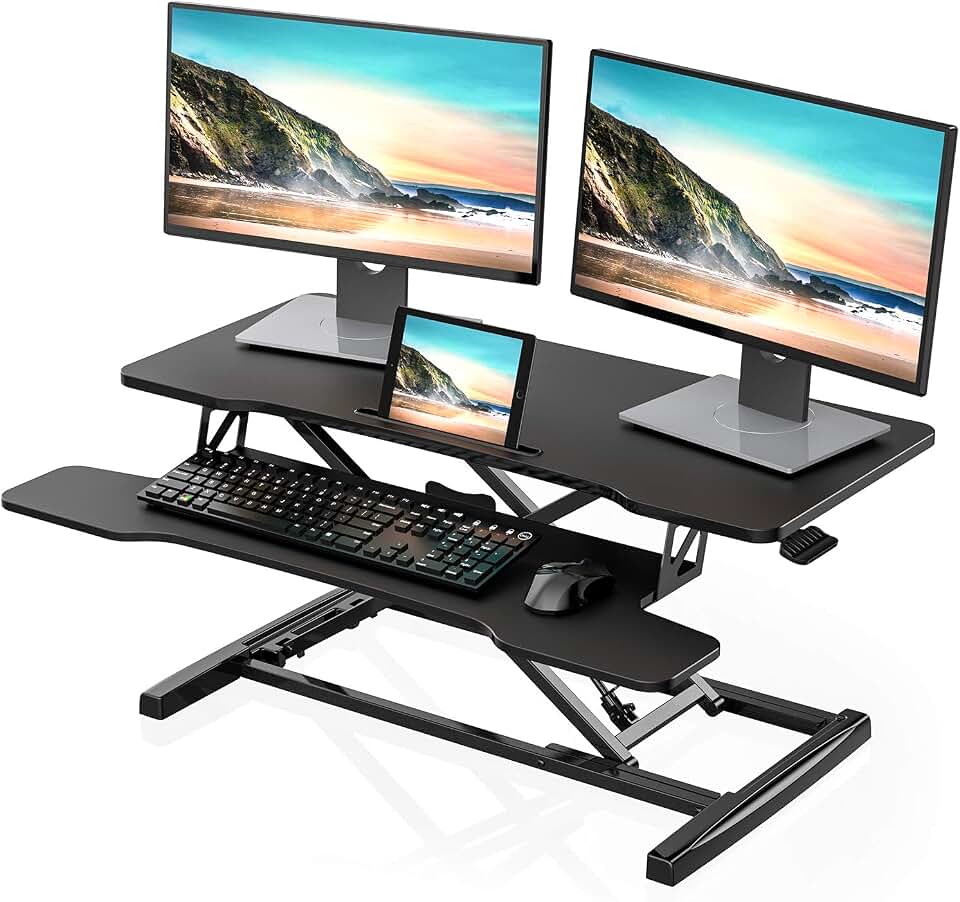 FITUEYES Height Adjustable Standing Desk 36” Wide Sit to Stand Converter | Standing Desk Converter,Stand Up Desk Riser,for Laptop Dual Monitor Riser,Tabletop Workstation for Home Office,Easy Assembly The Forest Stewardship Council